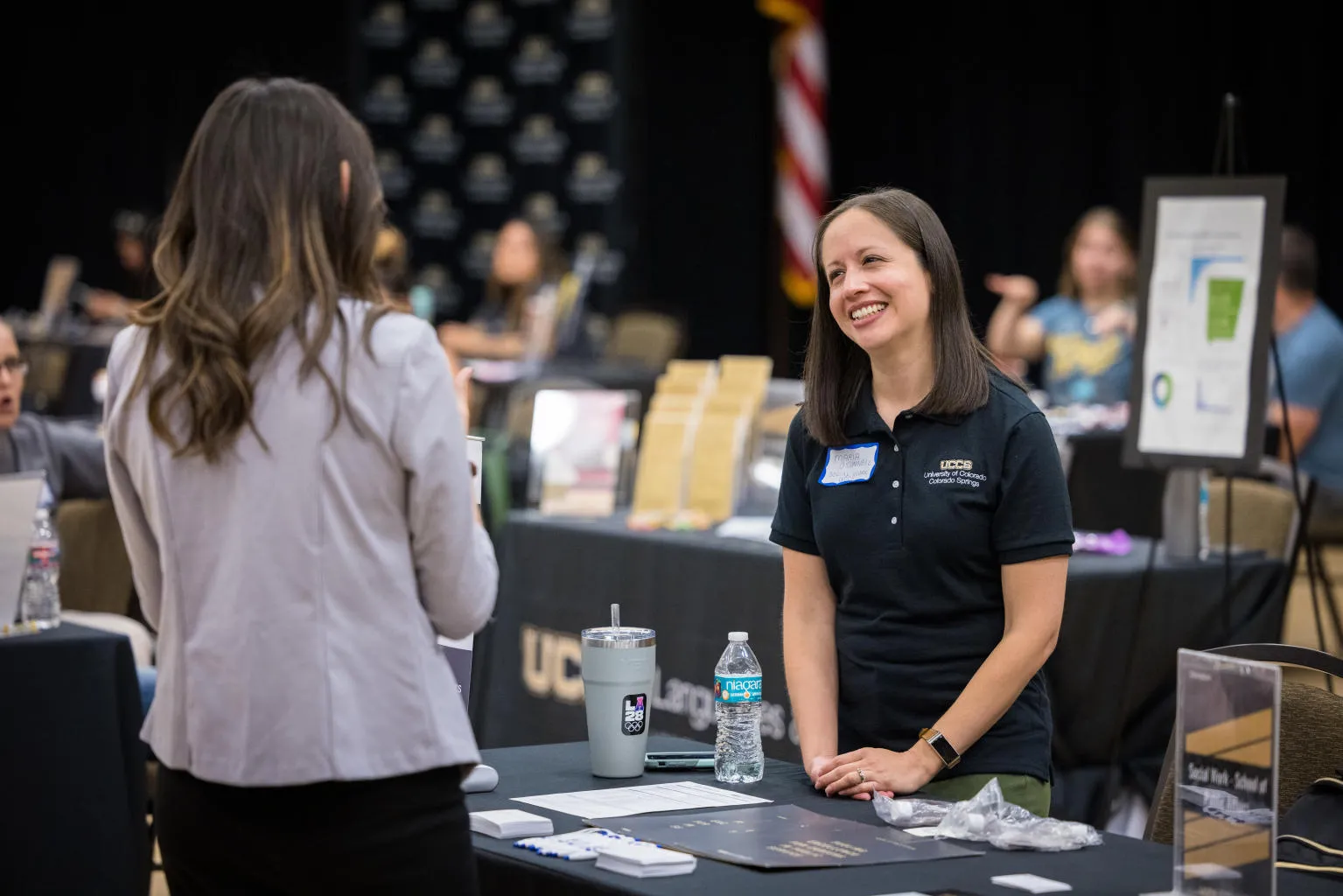 Individuals connecting at UCCS networking night